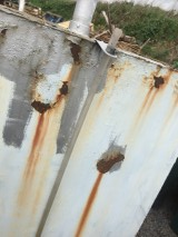More rust spot on a single skin oil tank in Essex 